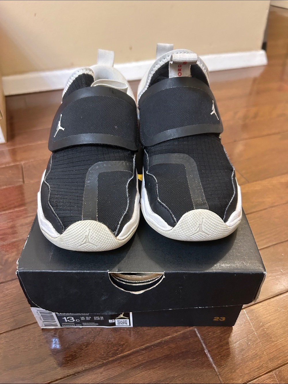 Nike Black and White Jordan Slip-On Sneakers